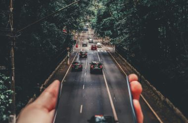 pexels-photo-799443-799443 Forced Perspective Photography of Cars Running on Road Below Smartphone